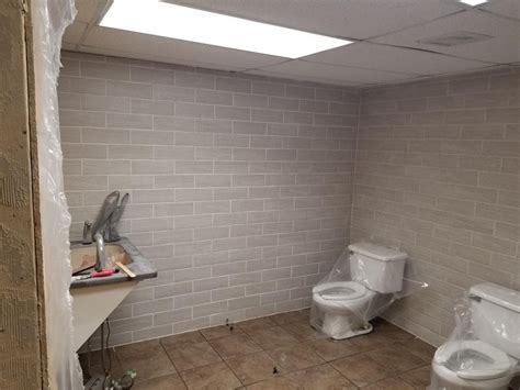 Commercial Bathroom Tile Design 的图像结果