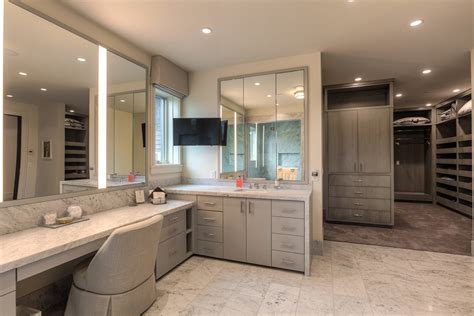 Master bath vanities and large walk-in closet; flat panel eurostyle ...