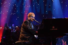 Image result for Elton John Playing Piano