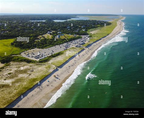 The cold waters of the Atlantic Ocean washes onto Nauset Beach in ...