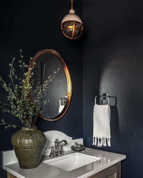 Dramatic and Modern Black Powder Room - Soul & Lane