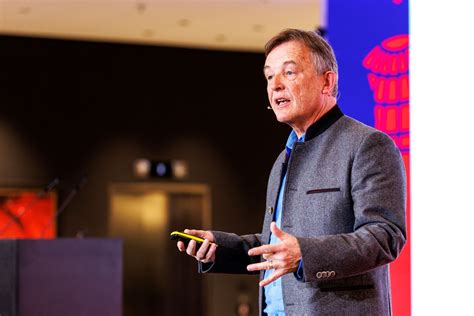 Elon Musk speaks during an interview with head of TED Chris Anderson (out of frame) at the TED2022:
