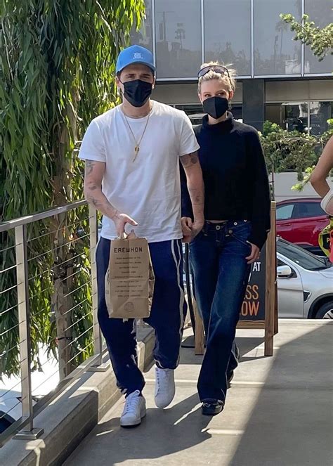 NICOLA PELTZ and Brooklyn Beckham Shopping at Erewhon Market in Santa ...
