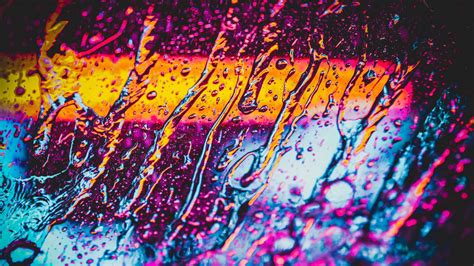 Download wallpaper 1366x768 glass, water, neon, rain, macro tablet ...