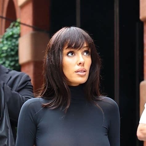 Bianca Censori wears a silver bodysuit for a unique bubble photoshoot