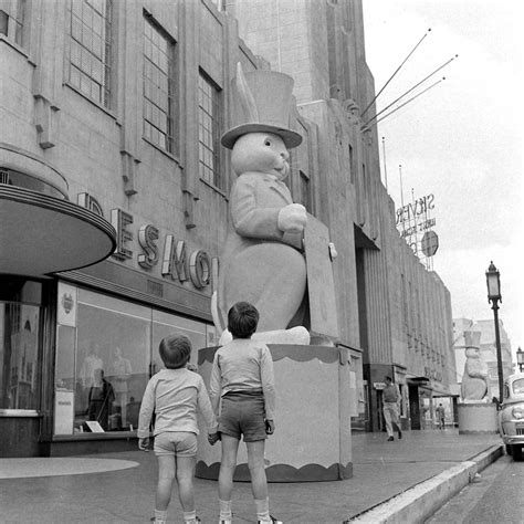 Giant Easter Bunnies stand outside Desmond’s department store, 5514 ...