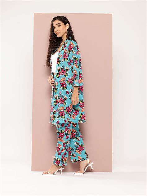 Tropical print shrug and pant co-ord sets.
