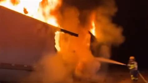 Tractor-trailer carrying cheese catches fire on Ohio interstate (video)