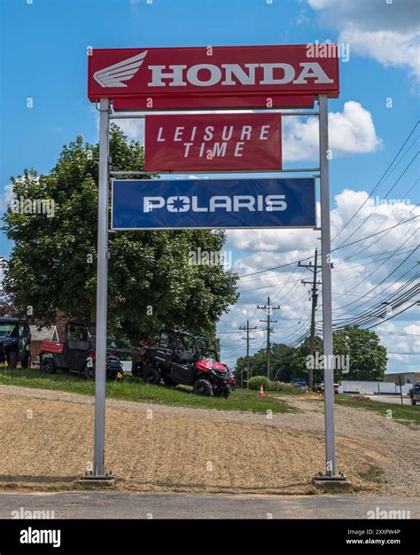 SIgns on the side of the road for a Honda and Polaris dealership in Corry, Pennsylvania, USA ...