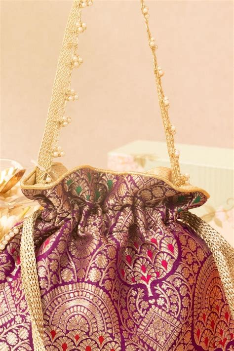 Buy AMYRA Kashi Pure Banarasi Silk Potli - Purple online - The AMYRA Store