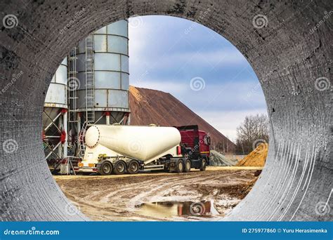 Large Truck for Transporting Cement. a Cement Truck Unloads Cement at a ...