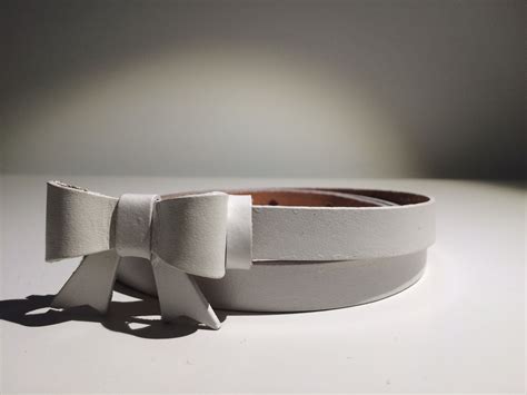 White thin belt Brand: No brand-Thailand Size: M Condition: Very Good ...