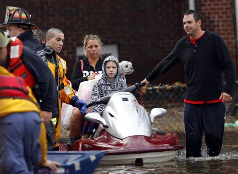 Photos of People Rescued from Hurricane Sandy; Firefighters Brave the ...