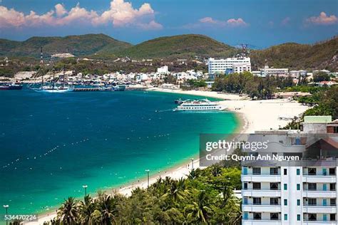 Photograph of Nha Trang beach with many high rise buildings behind it