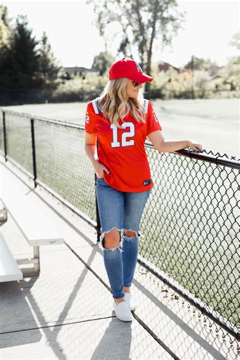 girlfriend wearing football jersey