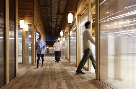 Gallery of Athletes' Village Plaza / Nikken Sekkei - 11