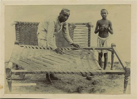 Charpoy (Indian Bed) being Strung or Restrung - c1900 - Old Indian Photos