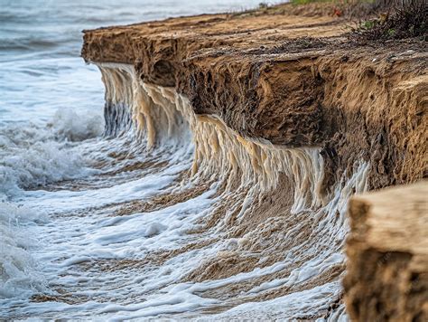 Coastal Erosion Caused by Rising Sea Levels | Premium AI-generated image