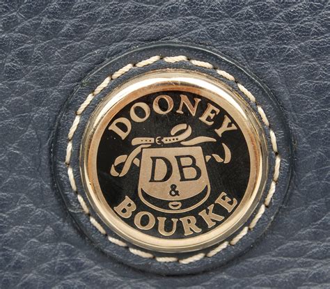 Lot - DOONEY & BOURKE NAVY LARGE DOMED SATCHEL