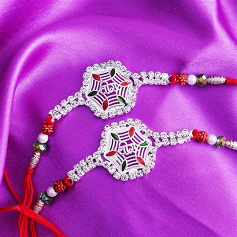 Send Two Designer Silver Rakhi Set Online