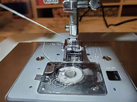 Image result for How to Thread Singer 603E