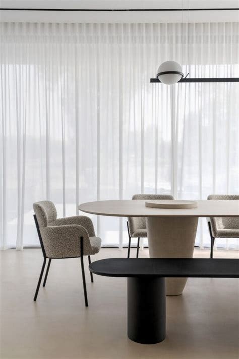 Custom-made Dekton tables and countertops dress up this Japandi-style ...