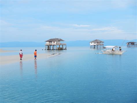 DOLPHIN WATCHING, MANJUYOD SANDBAR AND SPORTFISHING ADVENTURES IN BAIS ...