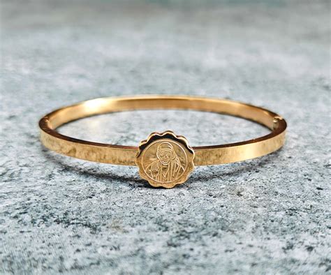 SHINDE EXPORTS saibaba bracelet for women with lock