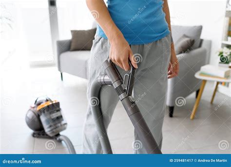 Woman Vacuuming the Floor at Home Stock Image - Image of electronics ...