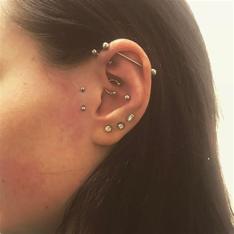 Surface tragus and daith piercing added for this lady this morning by ...