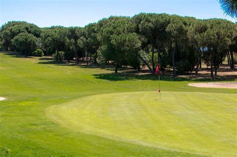 https://lecoingolf.fr/wp-content/uploads/2020/12/Golf-Nuevo-Portil-Green-du-trou-9-bunker-pins.jpg