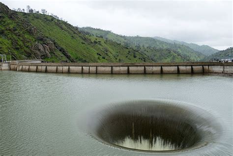 Portal to Hell: Giant hole in the middle of a lake in California leaves ...