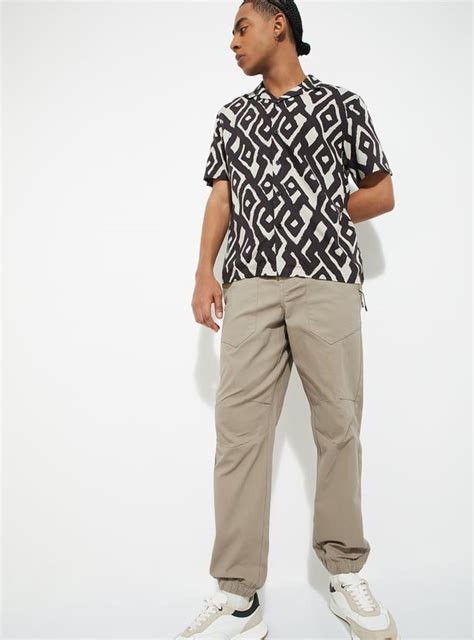 Buy URB_N Men Textured Relaxed Fit Joggers Online at just Rs. 1299.0 ...