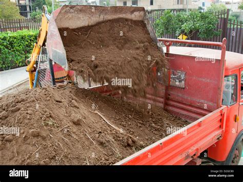 Image result for Large Excavators Loading Trucks