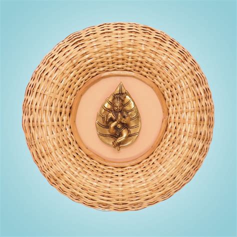 Brass Baby Krishna on Peepal Leaf 16" in Cane Wall Hanging