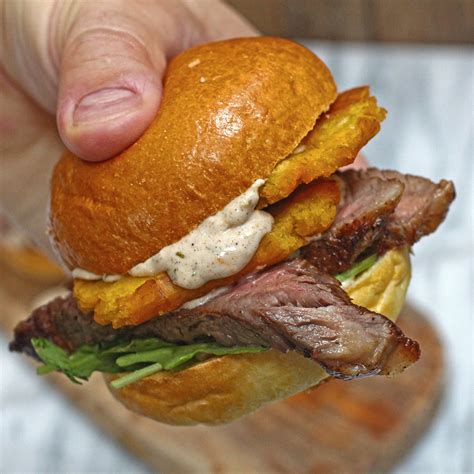 Ribeye Steak Sandwich with Tostones and Jerk Mayo