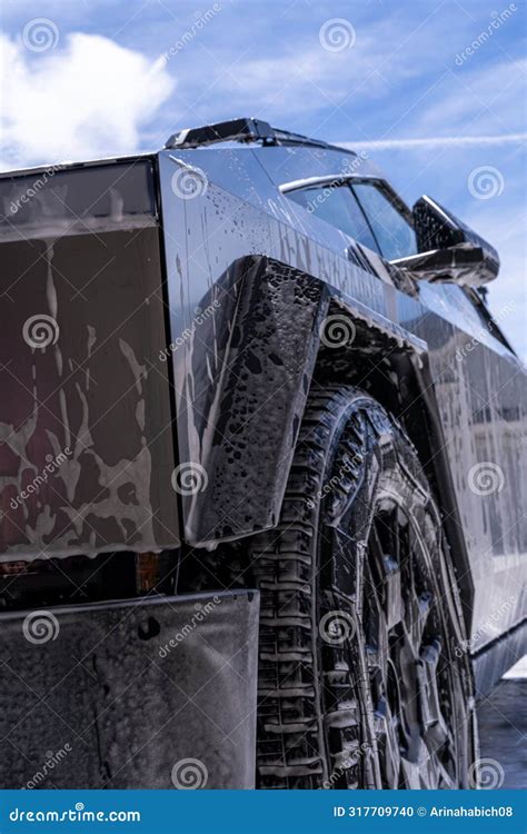 Washing a Tesla Cybertruck at a Car Wash Editorial Image - Image of closeup, water: 317709740