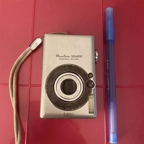 Canon PowerShot ELPH SD400-SILVER-5.0 MP-ULTRA... - Depop