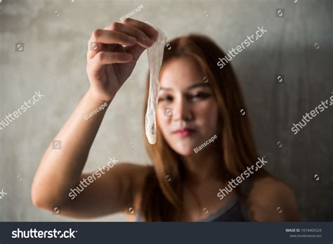 Asian Female Hand Holding Used Condom Stock Photo 1074405524 | Shutterstock