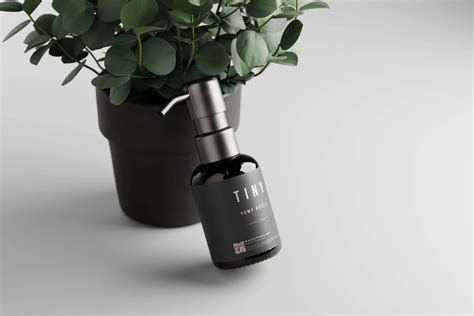 8 Free Small Amber Glass Pump Bottle Mockup PSD Set - Package Mockups
