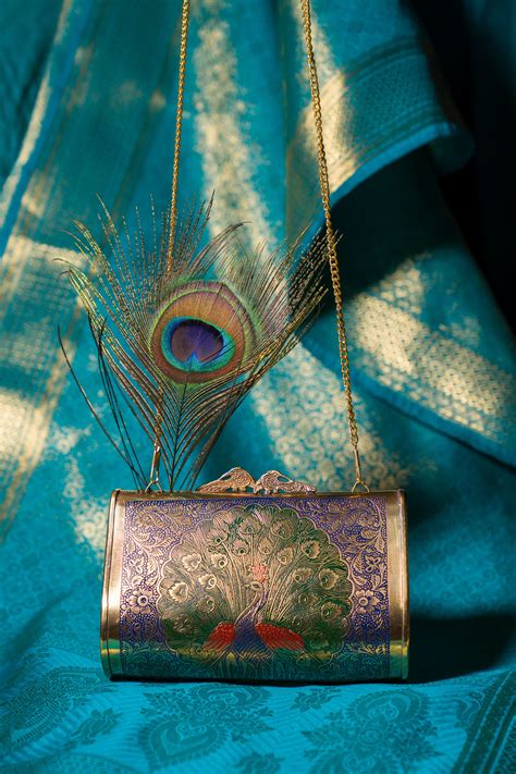 Peacock engraved vintage clutch – Tash Bags