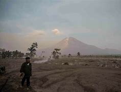 Image result for People Helping Mount Semeru Eruption