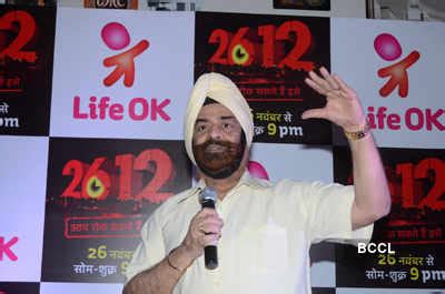 Ajit Thakur felicitates Dr.PS Pasricha during the launch of Life OK's ...