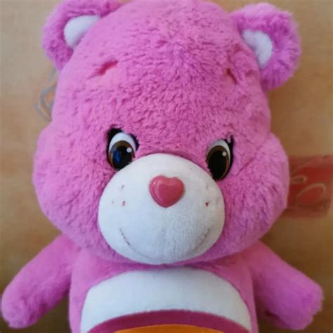 Care Bears Cheer Bear Pink with Rainbow Belly Size... - Depop