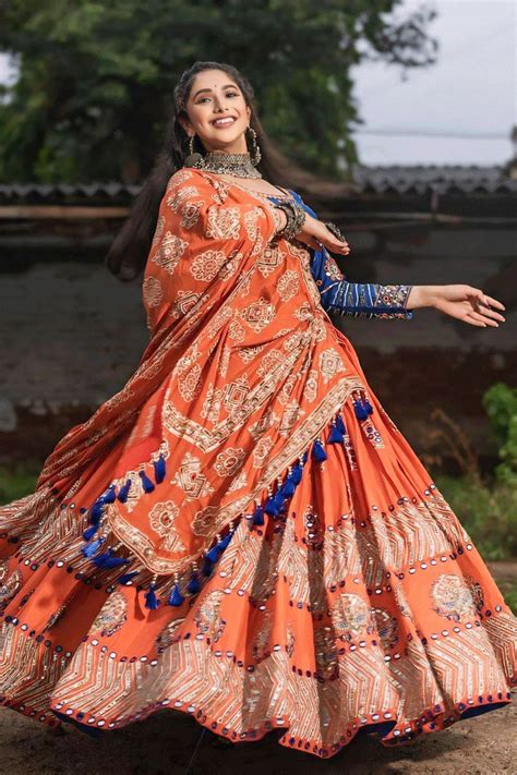 Traditional Heavy Flair Orange Chaniya Choli For Garba - Anaya Designer ...