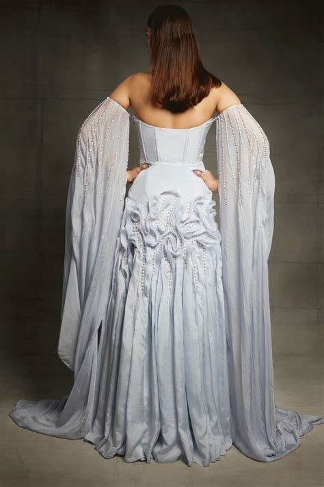 Ice Blue Embroidered Ruffle Gown With A Floor Length Drape On Both Sid ...