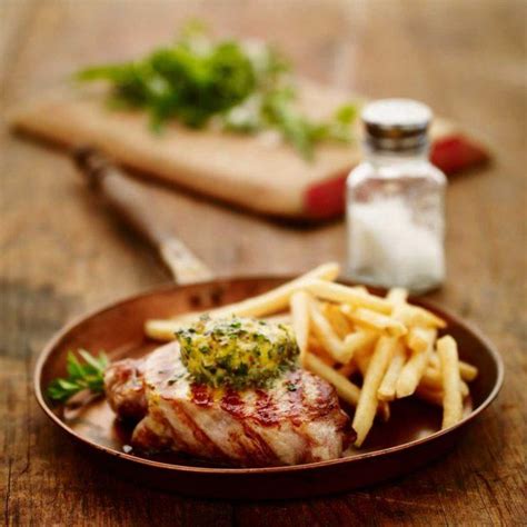 Pork Loin Steaks with Herb Butter and French fries