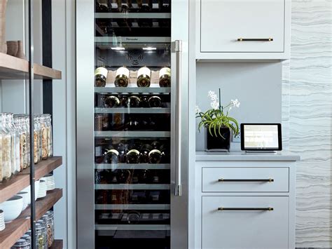 thermador wine refrigeration wine column next to shelf with white cabinets | Built in wine ...