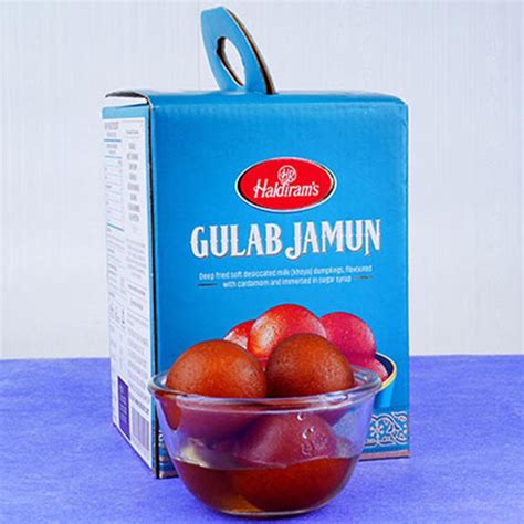 Send Ganesha Rakhi And Haldiram Gulab Jamun Tin Combo Online ...