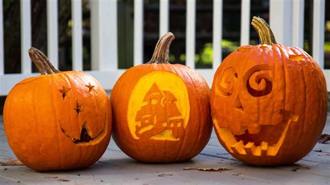 Download Three Pumpkin Carving Halloween Pictures | Wallpapers.com